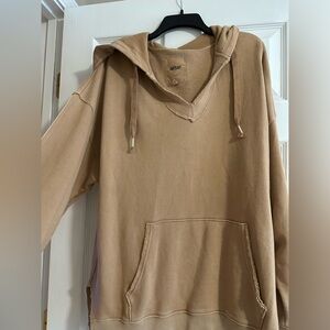 Aerie Women’s M pullover tan with pink and white on the tassels